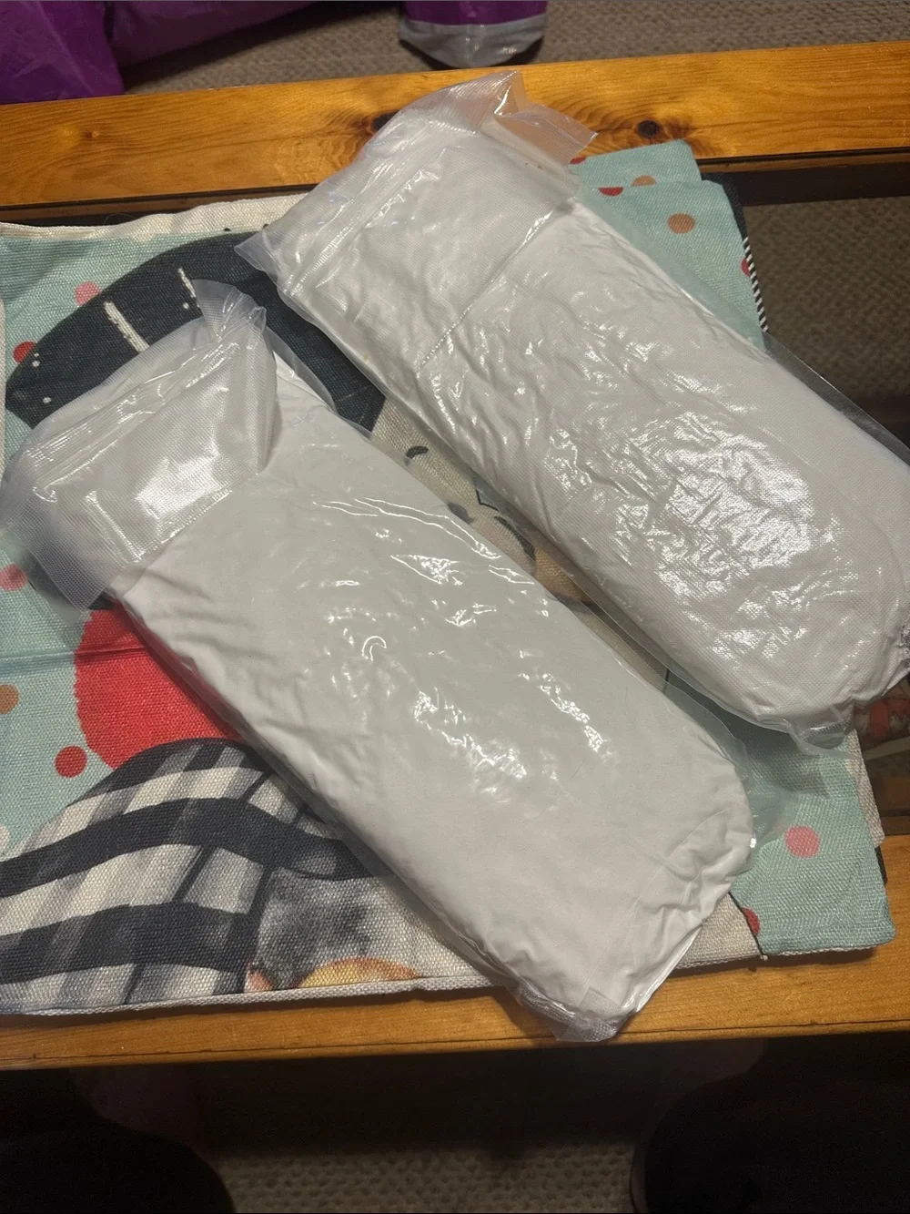 Christmas pillow covers and 3 never opened pillows.